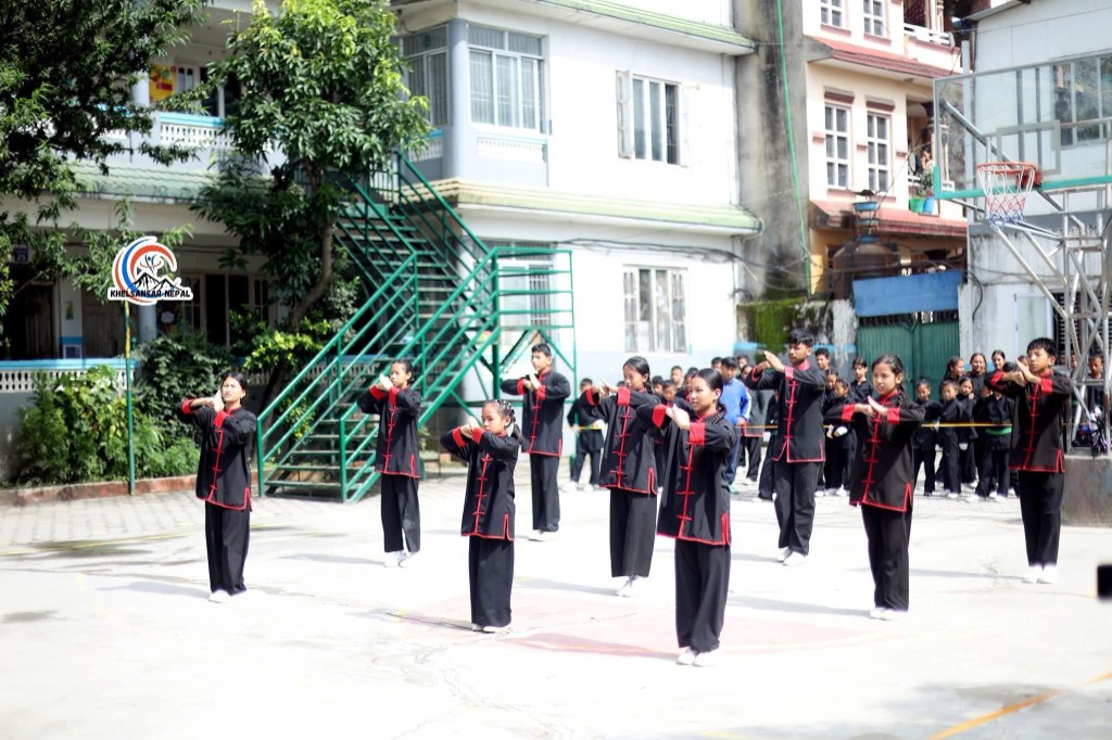 Young athletes in salute formation outdoors
